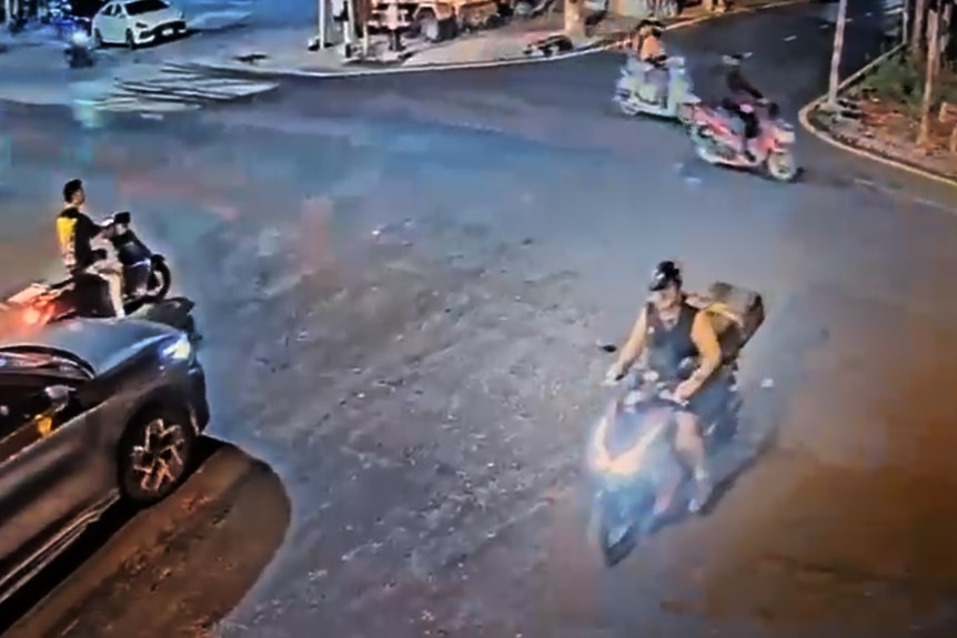Simon Carman on motorcycle