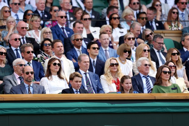 LONDON, ENGLAND - JULY 12: Prince William, Prince of Wales, Prince George, Princess Charlotte and Catherine, Princess of Wales, attend the Royal Box on day fourteen of The Championships Wimbledon 2026 at All England Lawn Tennis and Croquet Club on July 12, 2026 in London, England. (Photo by Clive Brunskill/Getty Images)