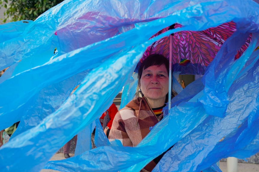 A woman in a giant jellyfish costume.