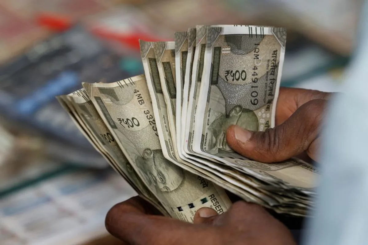 Rupee finds breathing room on oil pullback, soft dollar; Middle East risks linger