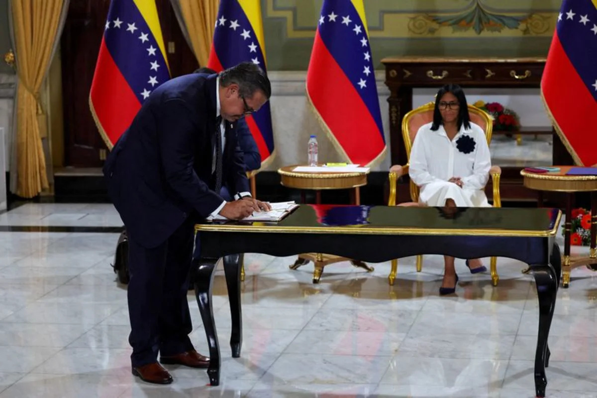 Oil executives rush to complete contract migration in Venezuela, sources say