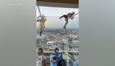 Police searching for 2 men who parachuted from Space Needle
