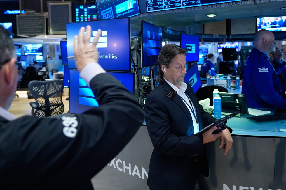 US stocks hold steadier after inflation data, even as IBM plunges