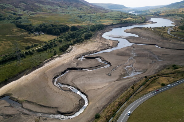 Woodhead reservoir is visible amid a drought near Manchester, England, Thursday, Aug. 13, 2026. (AP Photo/Jon Super, File)