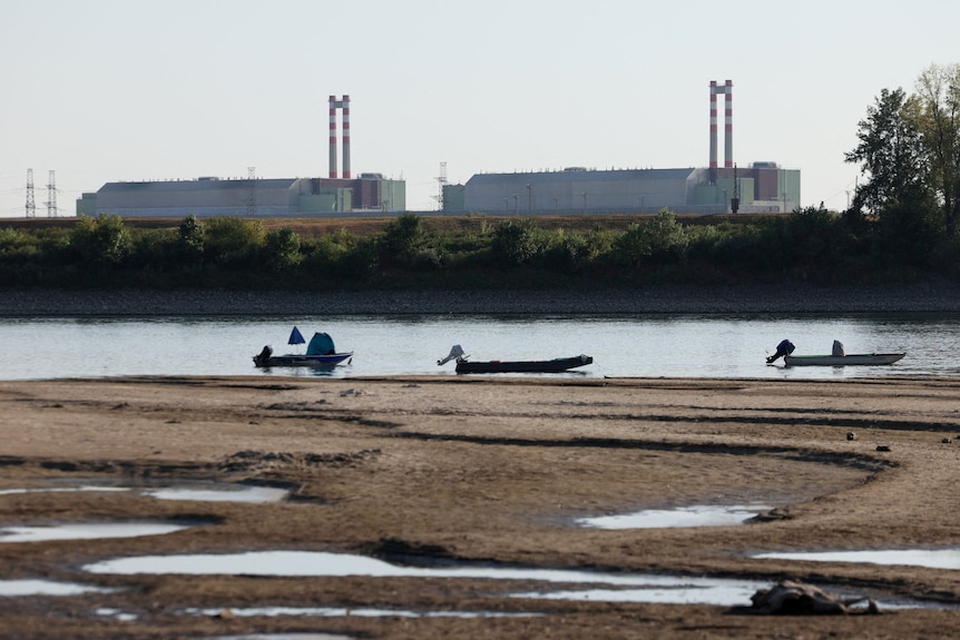 The Paks nuclear power plant with the partially dried up Danube