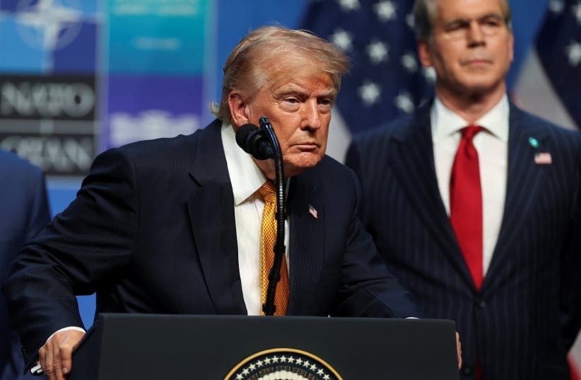US President Donald Trump reacts as he speaks to the media with US Treasury Secretary Scott Bessent behind him, on the day of a NATO leaders' summit in Ankara, Turkey, July 8, 2026.