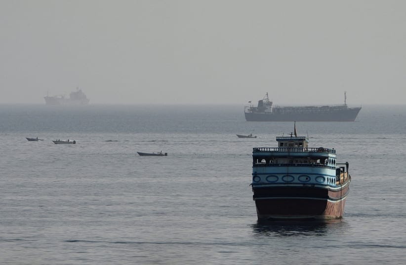 Vessels in the Strait of Hormuz, as seen from Musandam, Oman, August 3, 2026.