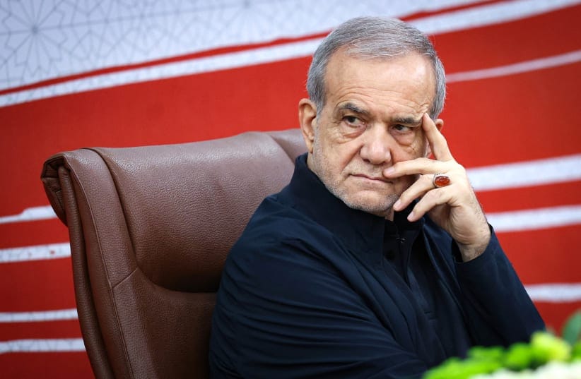 A handout photo made available by the Iranian Presidential Office shows Iran's President Masoud Pezeshkian attending a press conference in the capital Tehran, on August 8, 2026.