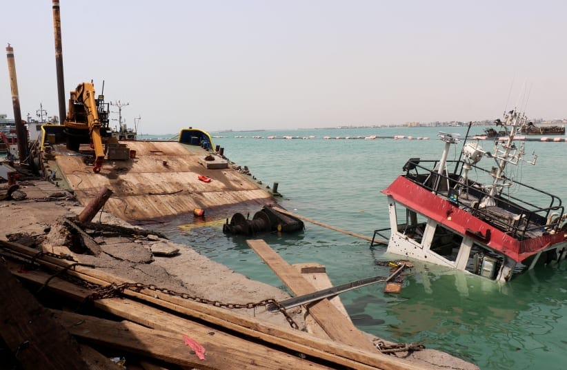 The navigation bridge of a sunken vessel is all that is seen at the surface of the water in the Port of Mokha the day after an attack by the Houthis on the city Mokha, held by Yemen's internationally recognised, Aden-based government on August 10, 2026; Illustrative.