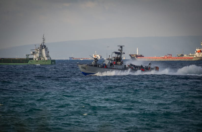 An Israeli Navy patrol boat sails off the coast of Haifa, as seen from Haifa beach, May 26, 2026. 