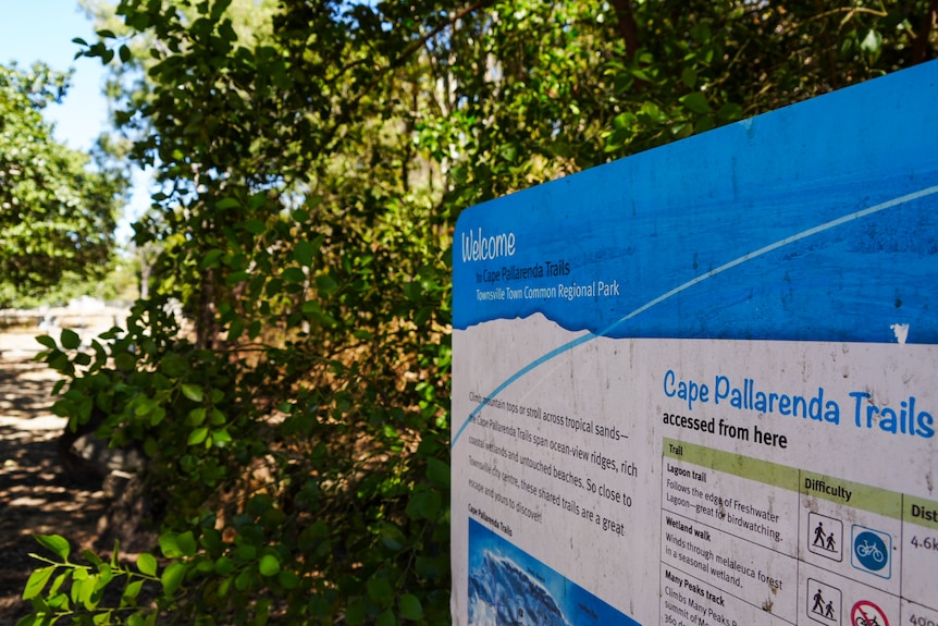 An information sign on the side of a bush track.