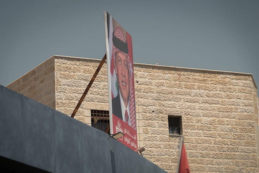 A poster of King Abdullah II hangs in Jordan.