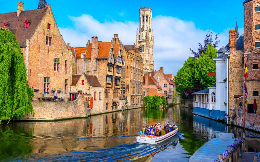 Classic view of the historic city center with canal in Brugge, West Flanders province, Belgium. Cityscape of Brugge.