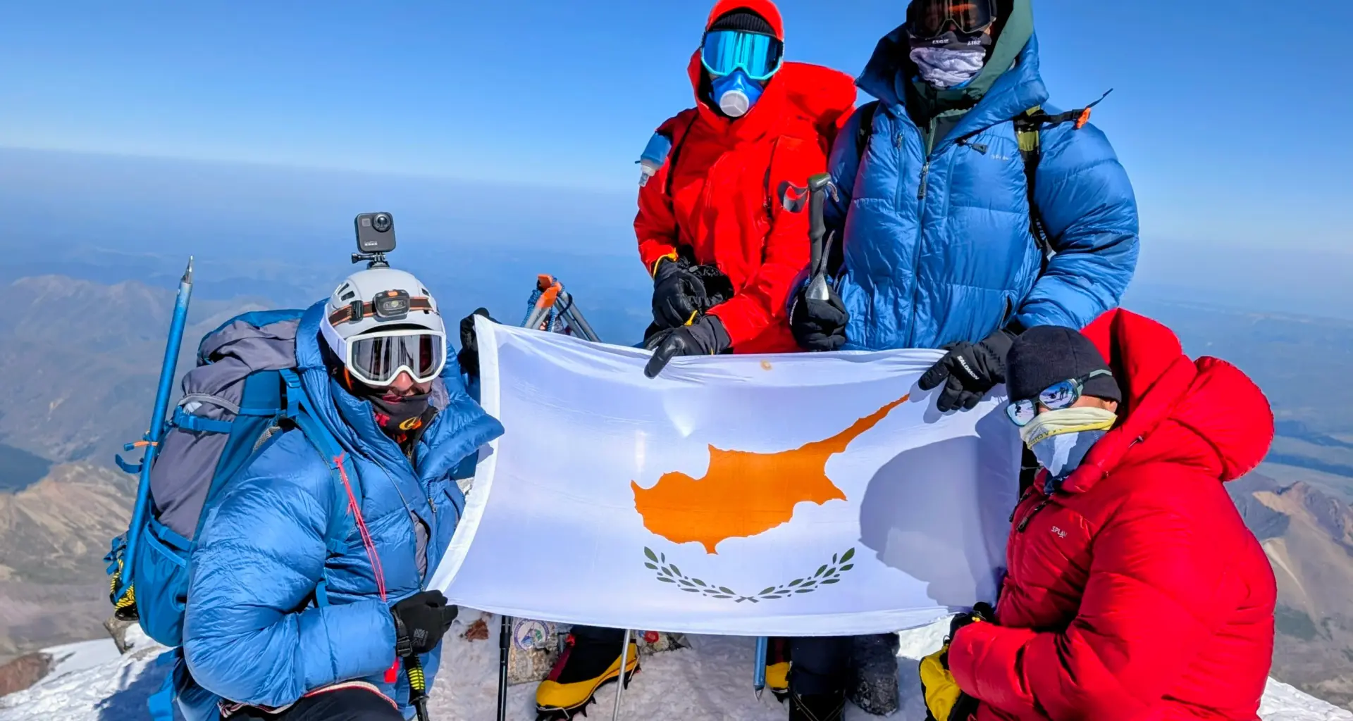 cover Cypriot climbers conquer highest mountain in Europe for cancer awareness