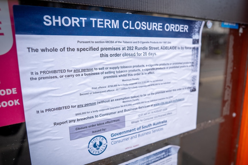 A store closure sign on a Rundle Street convenience store exterior after a penalty for selling illicit tobacco. 