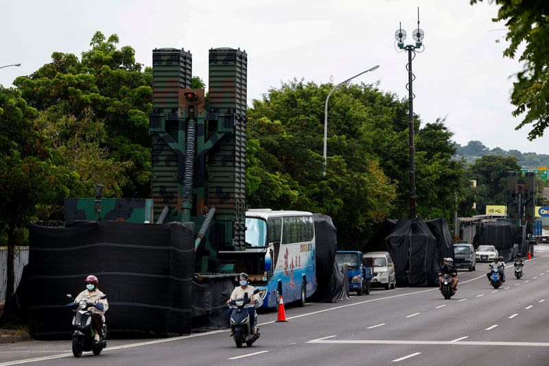 In Taiwan drill, armoured carrier takes president to command centre