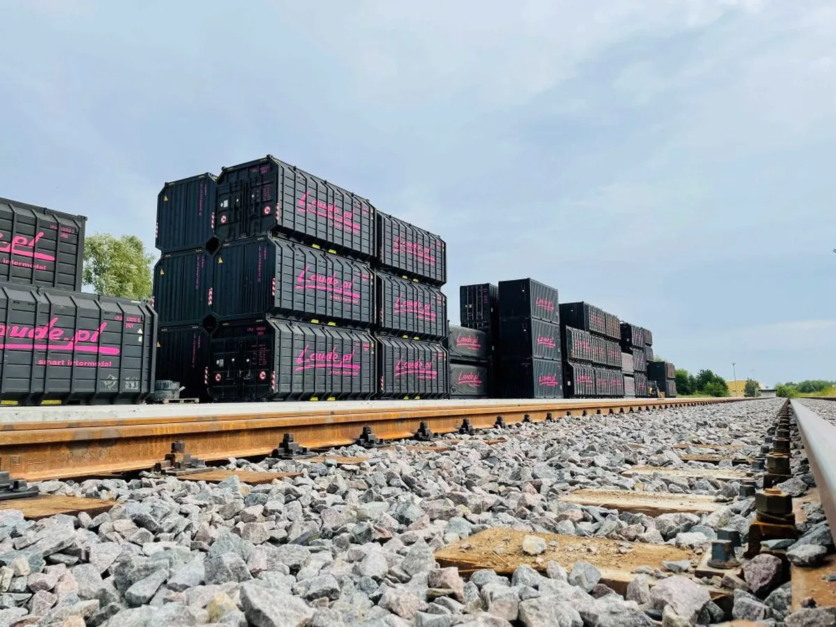 Biomass rail freight in Poland is expanding as Laude containers carry 4,500 cubic metres per train across different gauges.