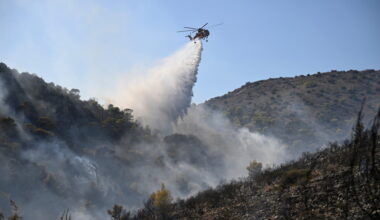 Firefighters battle wildfires in Belgium's High Fens and Greek island