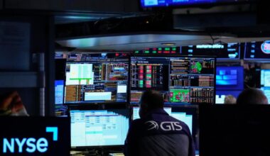 Stocks hold near records on hopes of an agreement with Iran