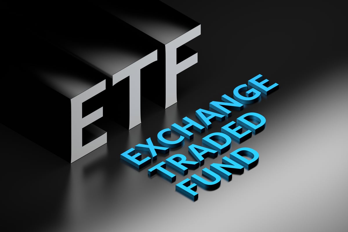 A graphic that includes ETF in white letters and the text "exchange traded fund" in blue letters