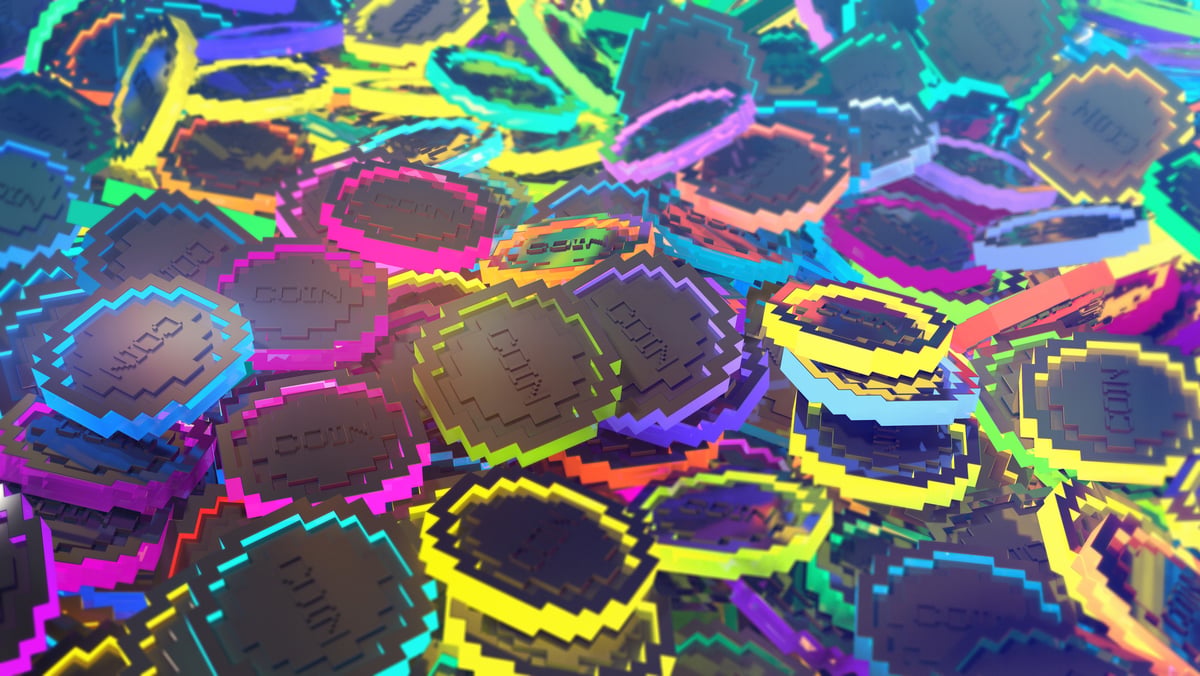 A pile of digital coins lie together.