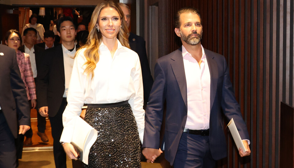 Donald Trump Jr., the eldest son of U.S. President Donald Trump, right, leaves a concert venue in southern Seoul after attending a flute recital by Han Ji-hee, wife of Shinsegae Group Chairman Chung Yong-jin, on April 29.