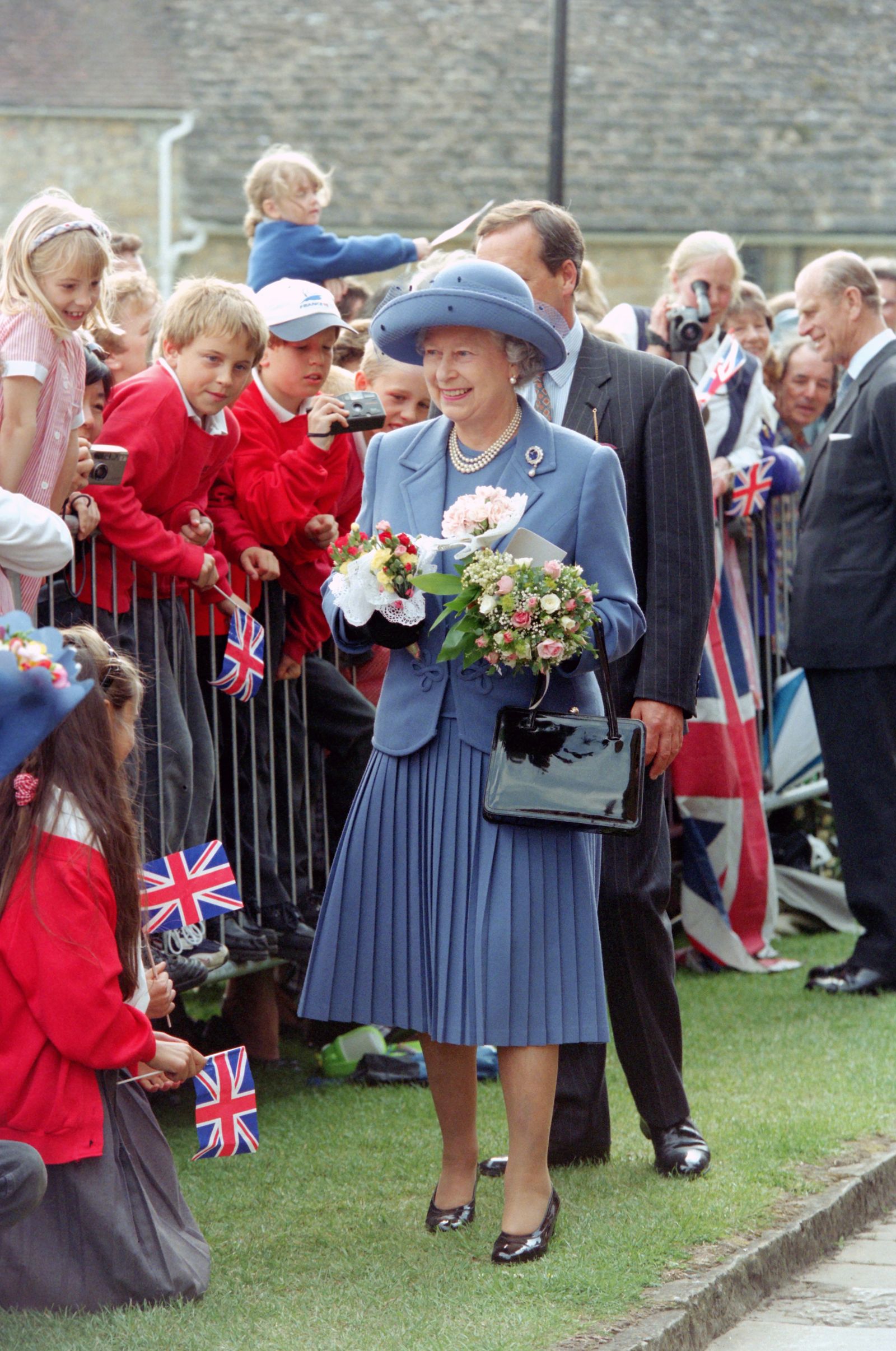 Image may contain Elizabeth II Freddy Kalas Mickey Daniels Prince Philip Duke of Edinburgh and Deborah Meaden