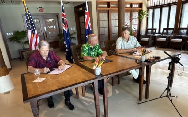 New Zealand's Foreign Minister Winston Peters, the Cook Islands Prime Minister Mark Brown and the US Deputy State Secretary Christopher Landau come together in Palau to announce a new upgrade of the port on Penrhyn atoll in the Cooks, 1 September 2026.