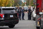 Law enforcement officers gather at the scene of a "critical incident" at the Chestnut Tree Inn in Portland, Ore., on Sept. 24, 2026.