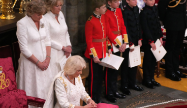 Queen's page boys dressed in mini regimental uniforms at coronation