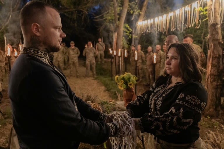 Amid war, Ukrainian soldiers celebrate love at ritual wedding