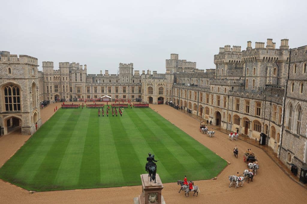 The carriage procession arriving in the Quadrangle at Windsor Castle